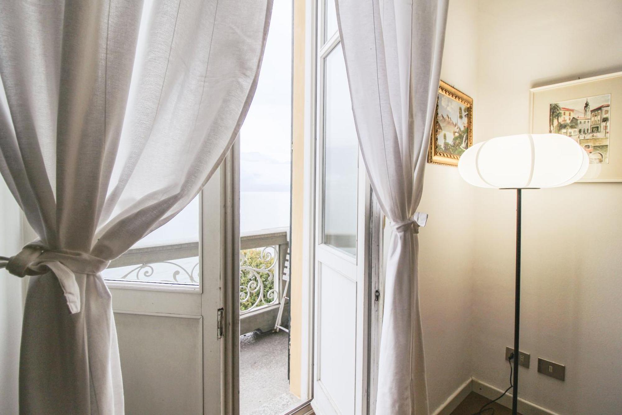Apartamento Lario Elegante Menaggio Exterior foto